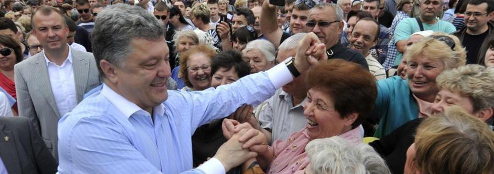 波罗申科宣布乌总统选举中获胜 季莫申科神情落寞