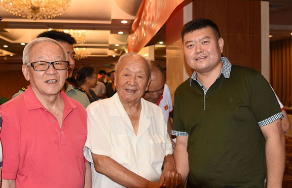 王定國扶貧基金會等講述王定國以及西路軍的故事