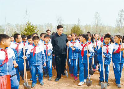 習近平：發揚前人栽樹後人乘涼精神