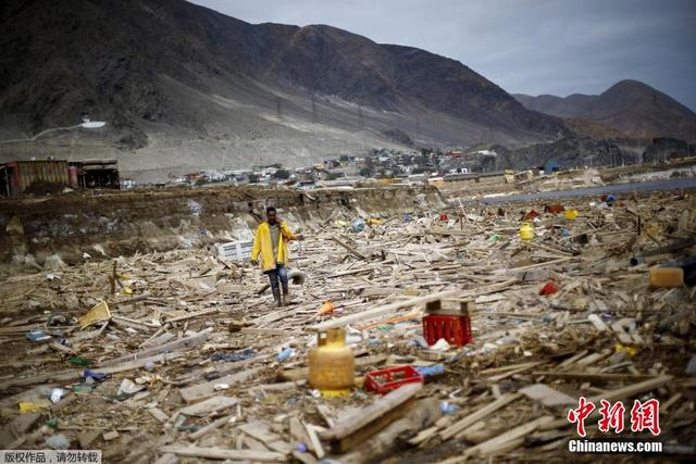 智利小鎮洪災後一片狼藉 居民廢墟裏重建生活