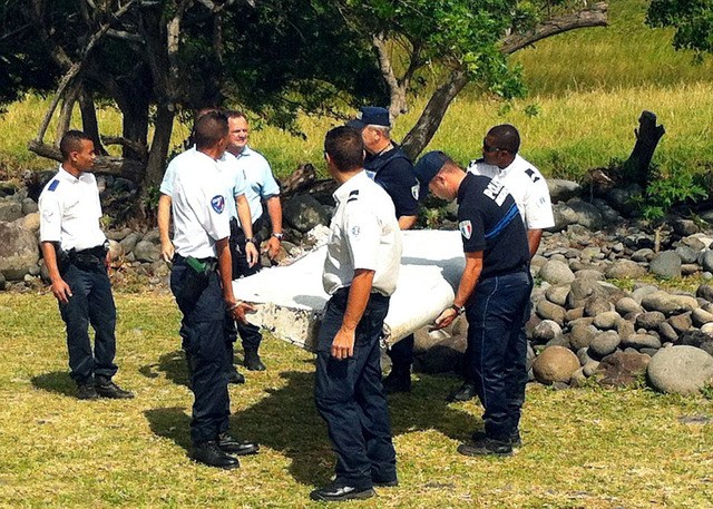 疑似MH370殘骸地發現中國礦泉水瓶