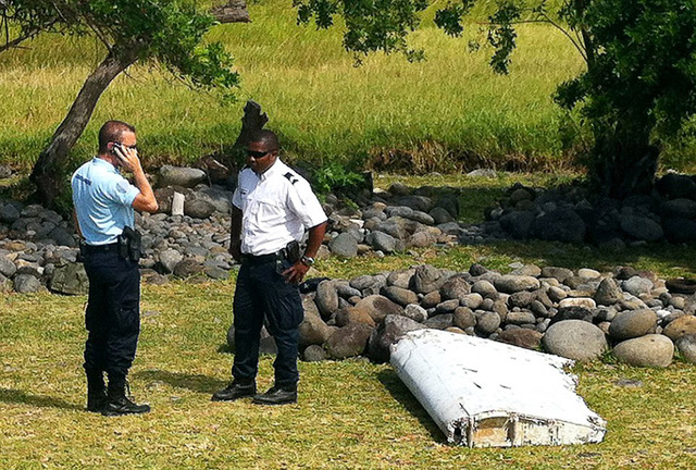 疑似MH370殘骸地發現中國礦泉水瓶