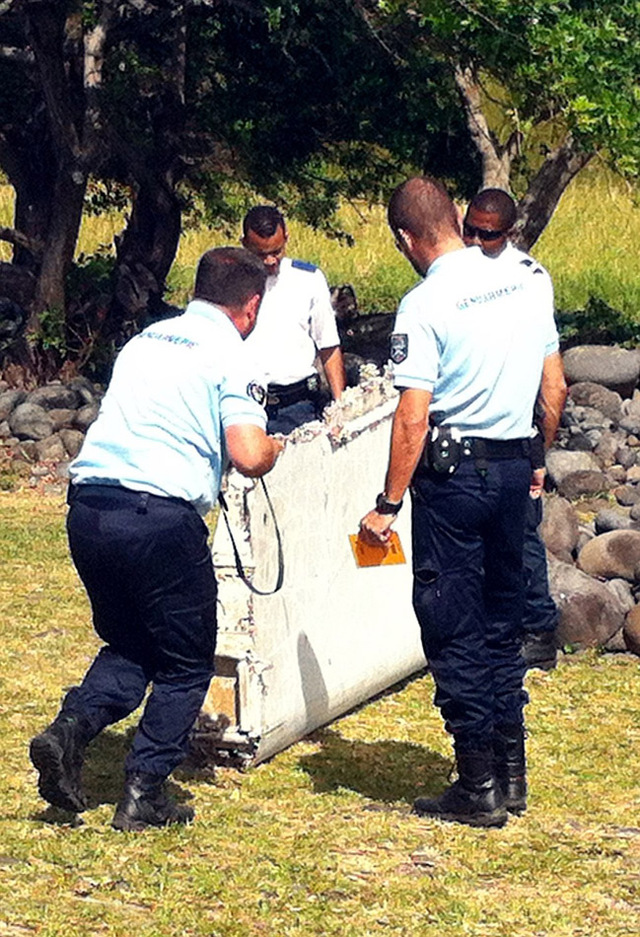 疑似MH370殘骸地發現中國礦泉水瓶