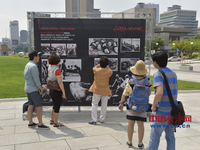 百餘張抗戰歷史圖片首爾展出 韓國老人講述日軍罪行