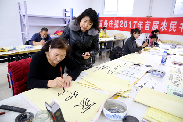 圖片默認標題_fororder_圖為平谷區夏各莊鎮書法培訓班學員在上課。馬春江攝 (20)_副本_副本