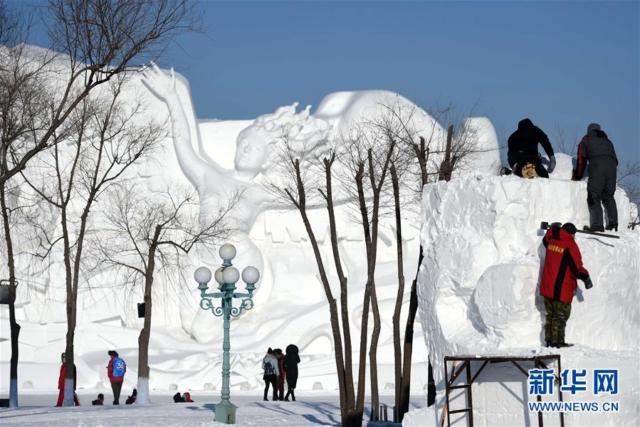 哈爾濱：國際雪雕比賽中的“嚴寒鬥士”