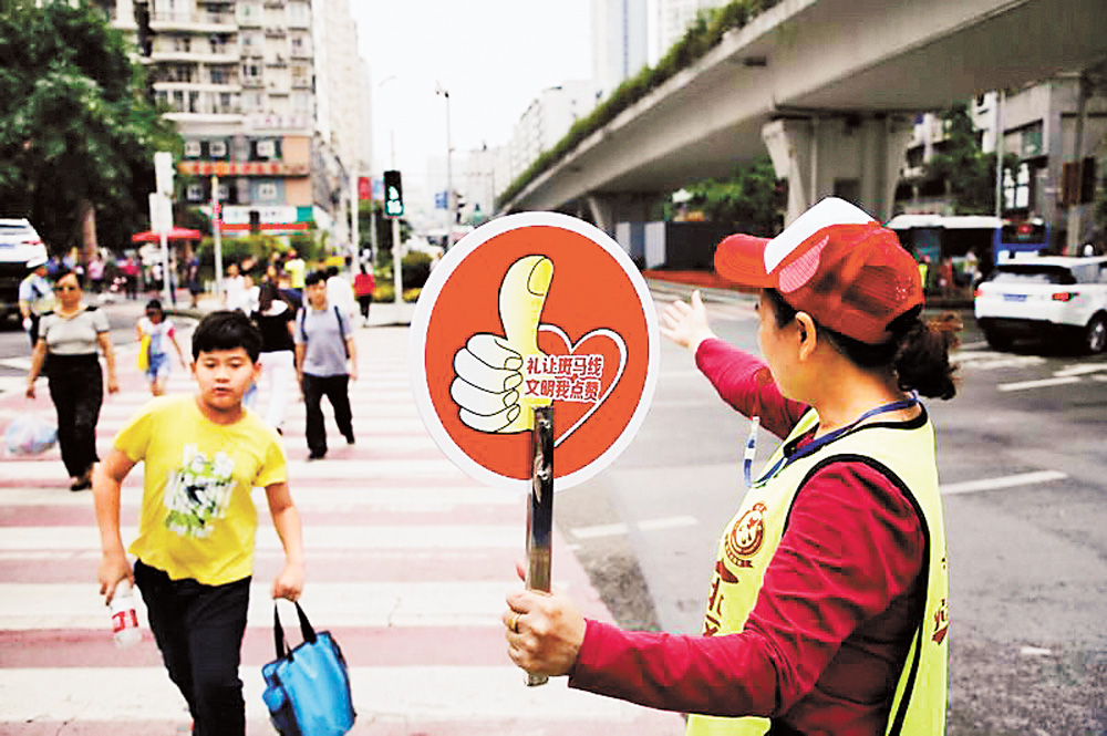 【焦點圖】“週六文明勸導我參與”志願服務范活動在渝北舉行