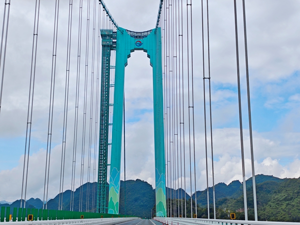 花江峽谷大橋正式通車 “橫豎世界第一”鑄就中國基建新豐碑_fororder_1