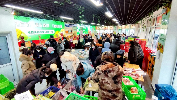 圖片默認標題_fororder_供銷超市春節期間銷售現場 張丹攝