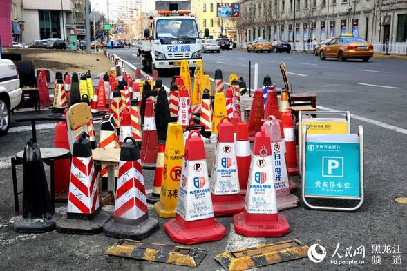 哈爾濱市多部門聯合治理私設擋車設施佔用停車資源違法行為