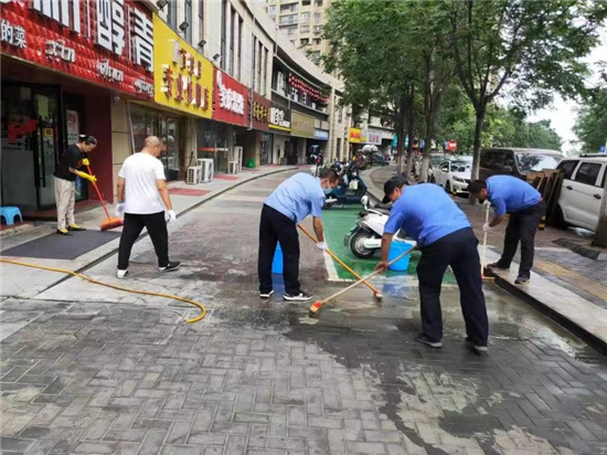 南京市雨花臺區西善橋街道清洗路面油污營造舒適環境_fororder_5