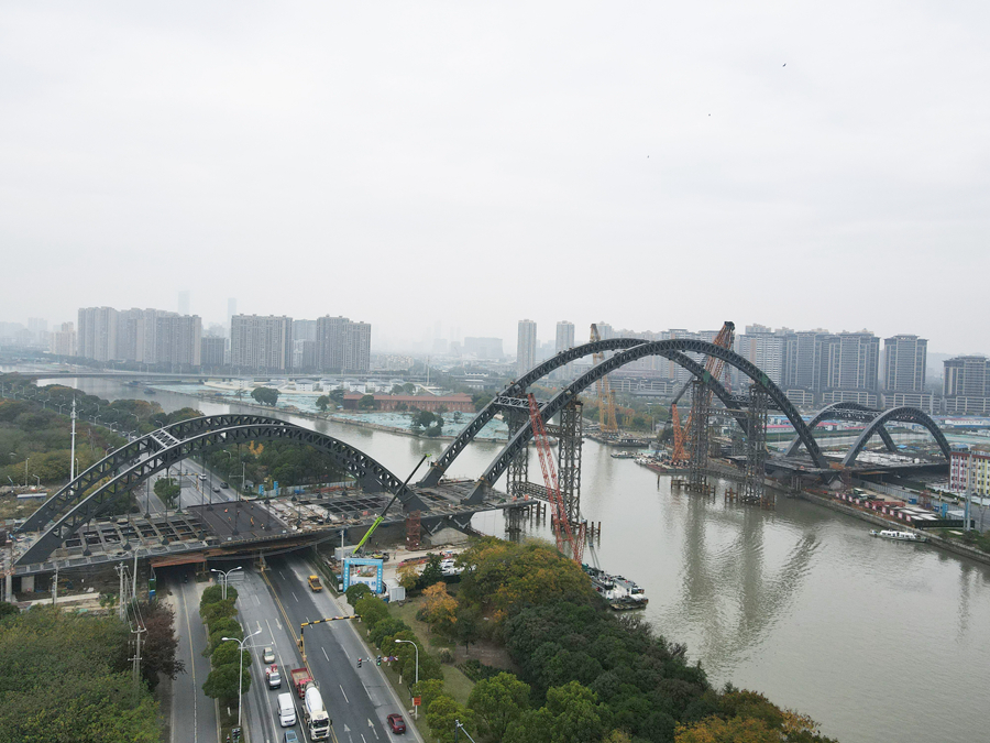 京杭大運河江蘇無錫段跨度最大的橋梁主拱完成合龍_fororder_LOCAL1670283429220QL2IRDESOY