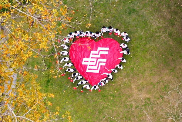 八年“郵愛”路 點亮萬顆星——寫在“郵愛公益”八週年之際