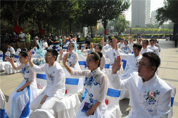 “丹青頌英雄，紅羅織嫁衣”瀋陽市皇姑區為抗疫情侶舉辦集體婚禮_fororder_婚禮2