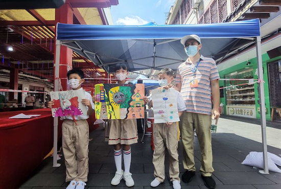 （發城市頻道）支援抗疫 海口市瓊山第二小學少先隊員致敬“最可愛的逆行者”_fororder_2