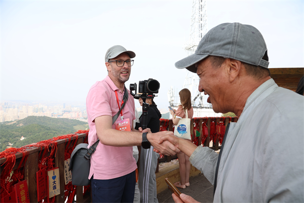 2024年“東亞文化之都”｜海外旅遊達人：“想通過鏡頭讓大連走向世界 它值得被更多人喜愛”_fororder_大連行值得5