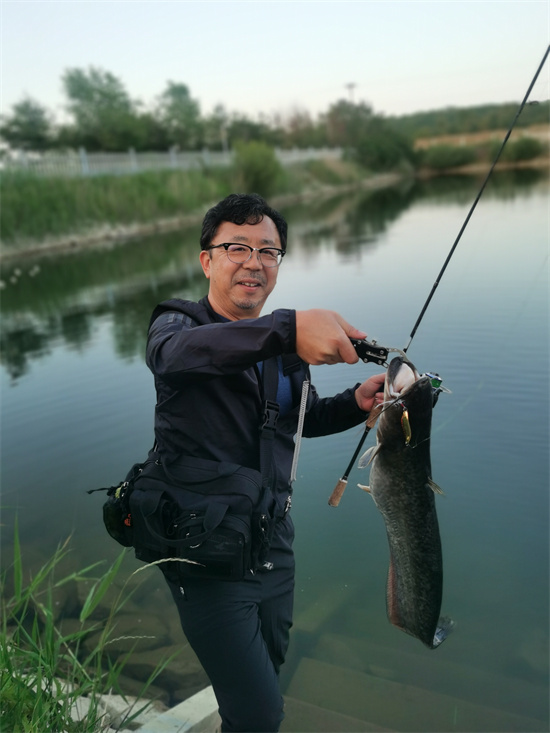 我在大連這十年 | 日企高管中川三千浩：我為大連的營商環境點讚_fororder_最喜歡釣魚，尤其是河釣湖釣