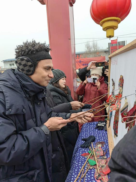 Foreign Visitors Treated to Special Chinese New Year Market, Fun in the Snow, Hot Springs, Liaoning Cuisine_fororder_圖片2