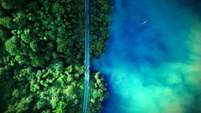 Mist Rises Over the Xiaodongjiang River
