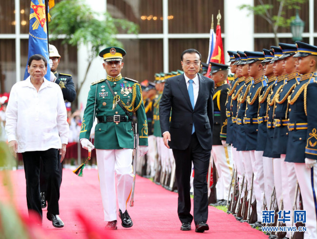 چین اور فلپائن نے تعاون کے چودہ معاہدوں پر دستخط کرتے ہوئے دو طرفہ تعلقات کی مضبوطی کا عزم ظاہر کیا ہے