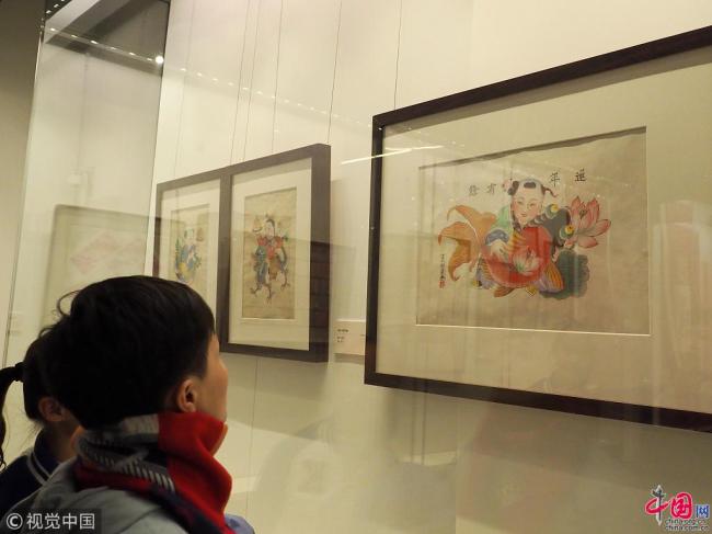 Exposition à Beijing d’antiquités sur le thème du chien et du Nouvel An chinois