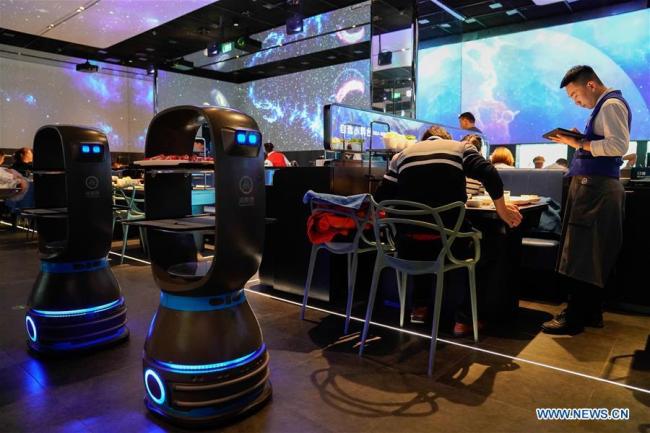 Beijing : gros succès pour un restaurant de fondue chinoise à intelligence artificielle