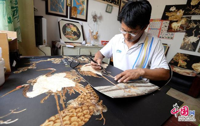 Guo Shunling, un paysan qui peint avec des épis de blé