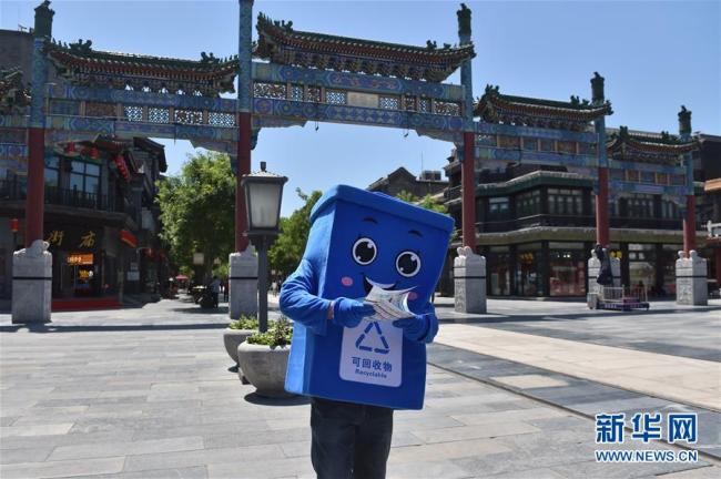 Beijing : des activités à Qianmen pour promouvoir le tri des déchets