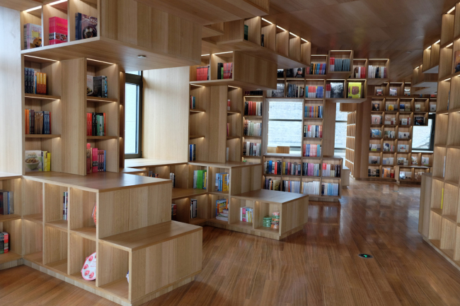 La librairie PageOne, inaugurée en novembre dernier, est considérée par les lecteurs chinois comme l’une des plus belles librairies de Beijing