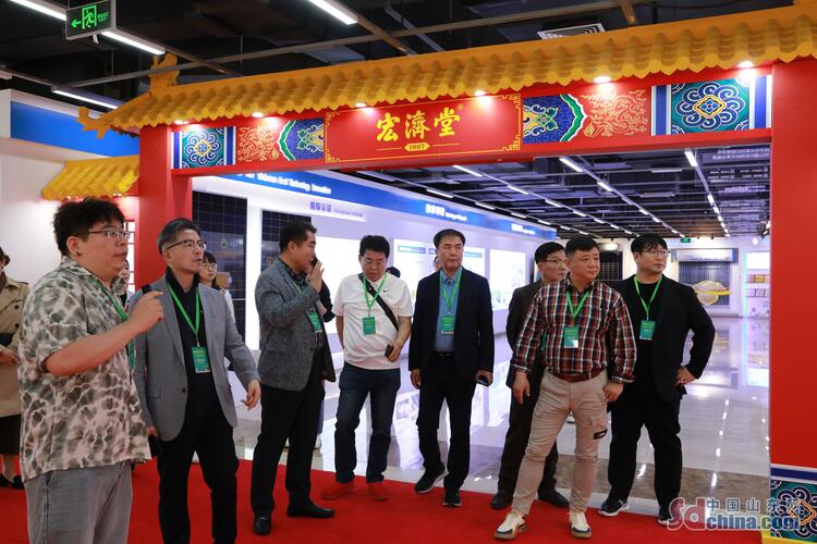 韓國媒體採訪團走進百年宏濟堂 感受中醫藥獨特魅力_fororder_6ca520972d934c08a0cdf0c6566944fd