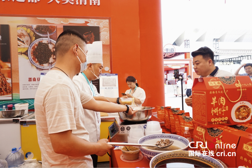 特色珍饈C位出道 第九屆絲博會渭南美食圈粉外國客商_fororder_圖片5
