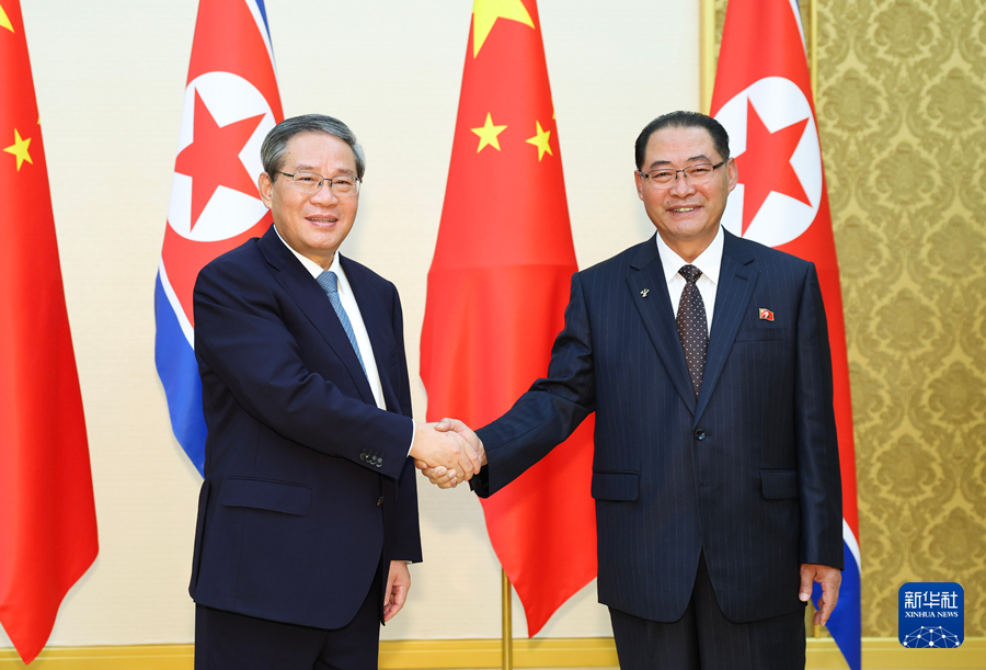 李強同朝鮮內閣總理樸泰成會談