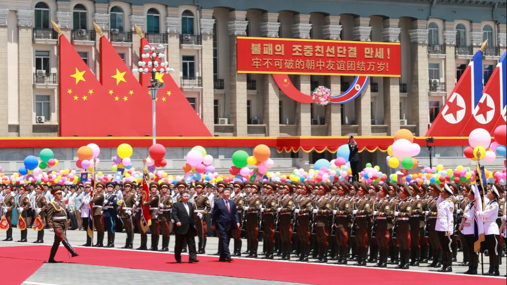 習近平出席金正恩舉行的歡迎儀式_fororder_20260608794b9c4f0ffc4f18a35d5cb437639254_20260608098d933837464ab4a52bc00c7580f77b