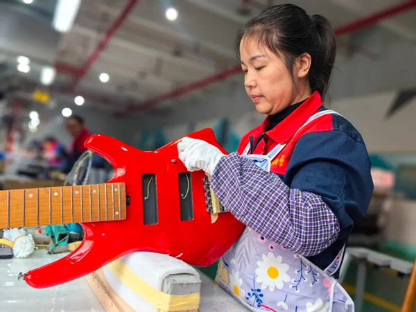 貴州正安吉他：乘開放東風，拓展海外市場_fororder_1