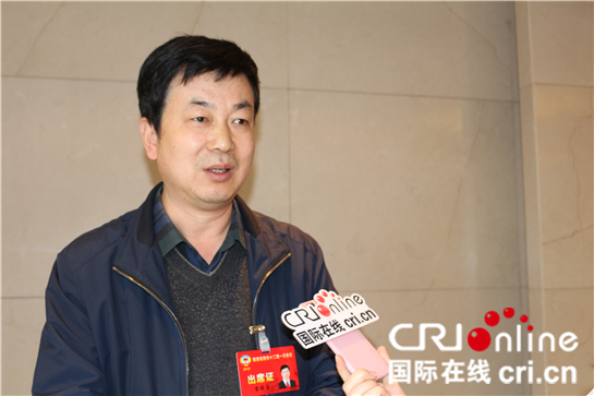 政協委員雷耀堂：保障農民工兄弟拿到錢 過好年_fororder_原圖_副本