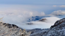 雪後泰山披銀裝 雲海日出醉遊人