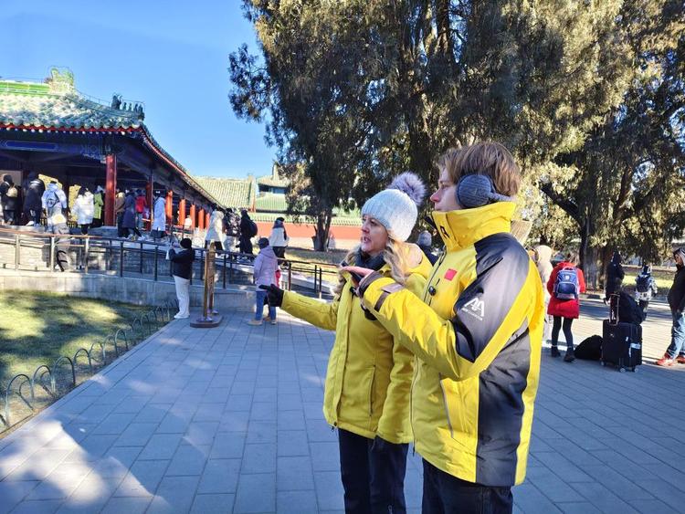 新春走基層·記者體驗360行丨同老外“China Travel”：“春節是中國的，也是世界的”