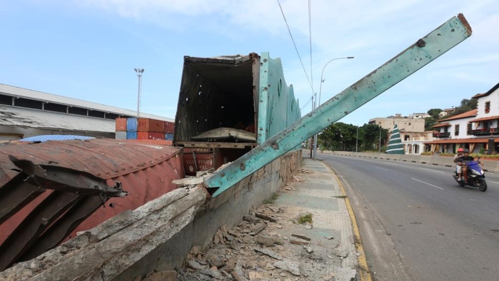 深追蹤丨從暗戰到突襲 專家：美長期覬覦委石油資源 動手只是時機問題_fororder_這是1月3日在委內瑞拉拉瓜伊拉港拍攝的空襲造成的建築殘骸